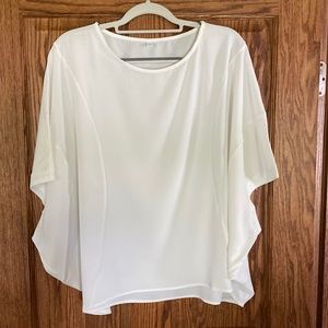 Batwing style soft white top size large w/out tags but never worn.